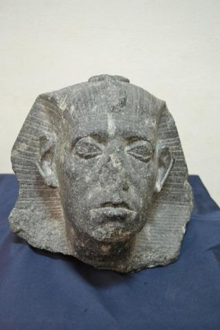 رأس الملك سنوسرت الثالث قطعة الشهر بالمتحف المصري، احتفالا بعيد الشرطة.